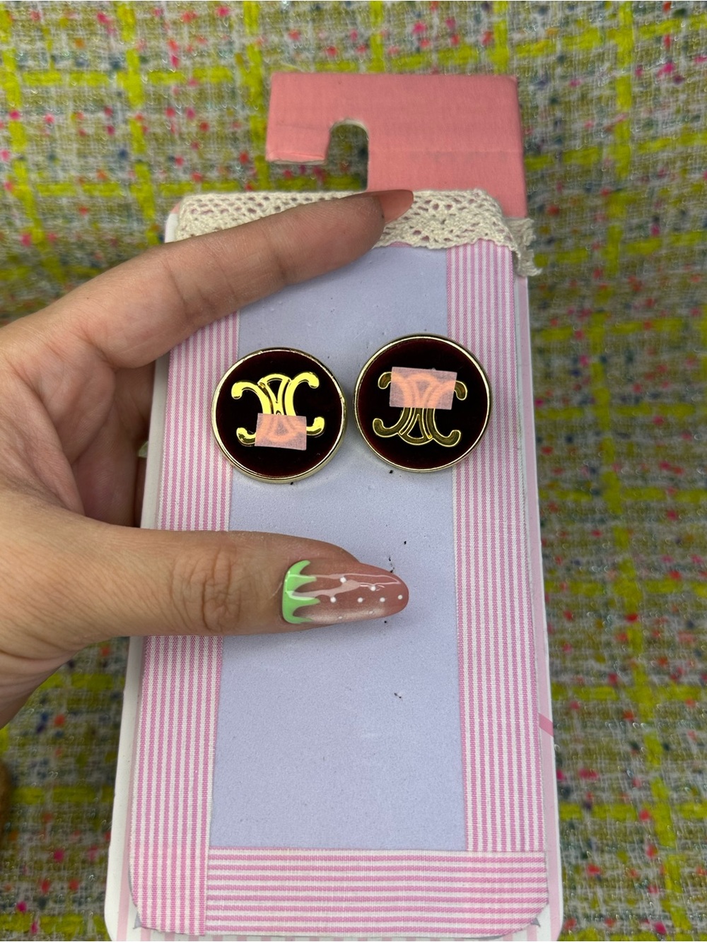 AA great Gold-Tone Black Enamel Logo Stud Earrings